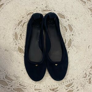 Black suede Tory Burch ballet flats.